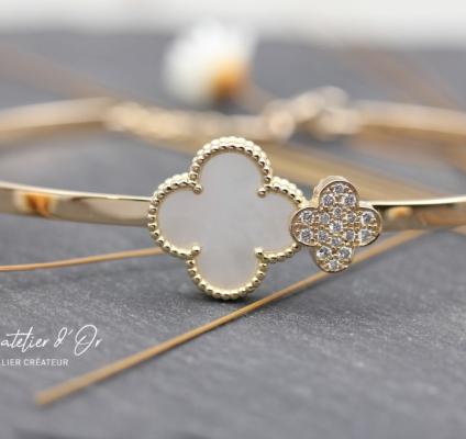 Jonc ajusté en or jaune 18 carats  avec nacre et diamants